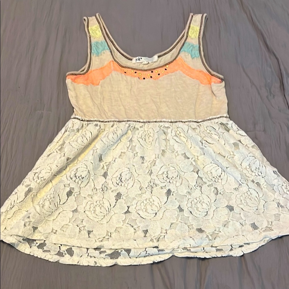 Gently used top from Buckle. Vintage. Comfortable flowy fit. Size Medium